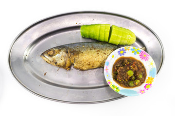 Fried mackerel with cucumber and Nam Prik on the long aluminium dish