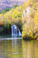 National park Plitvice lakes in Croatia, waterfall in fall landscape 