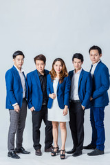 Obraz premium group of people in business suit photoshoot in studio isolate white background