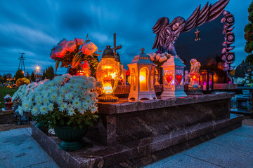 Graves on catholic cemetery. All Saints Day / All Hallows / 1st November.