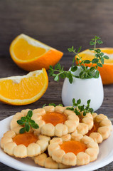 Biscuits with orange jam and thyme.