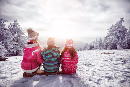 Ski, winter, snow and fun - family enjoying winter