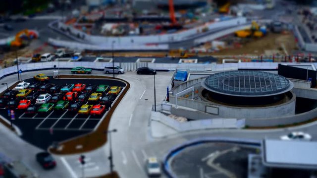 Tilt-shift aerial time-lapse shot of Taxi stand at Tokyo station