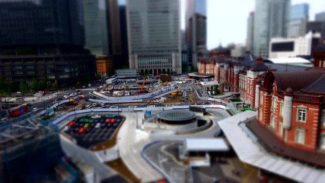 Tilt-shift aerial time-lapse shot of Taxi stand at Tokyo station