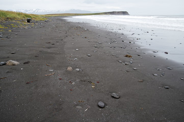 Typical Icelandic landscape, a wild nature of rocks and shrubs, rivers and lakes.