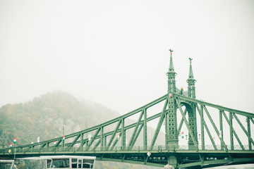 old bridge in Budapest during fog