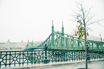 morning in old european city bridge in fog