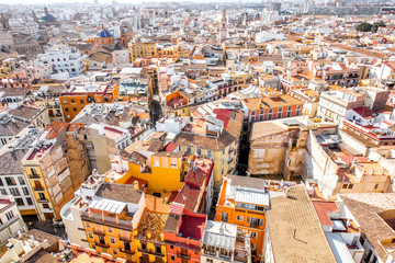Top cityscape view on the old residential buildings in Valencia city during the sunny day in Spain