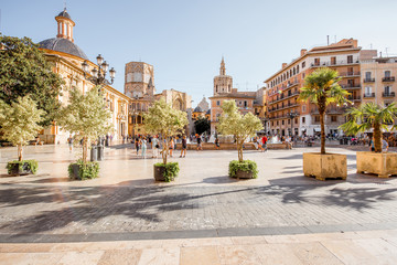View in the Virgen square with cathedral in the centre of Valencia city during the sunny day in Spain