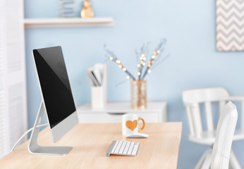 Comfortable workplace with modern computer on table