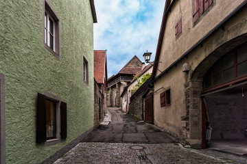 Fototapeta na wymiar Old alleyway in Rothenburg ob der Tauber in Germany