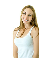 Young beautiful woman's portrait over white studio shot. Cheerful attractive girl looking at camera and happy smiling, isolated on white background.