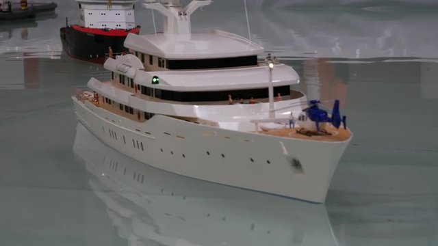 The luxury motor yacht and icebreaker ship. Miniature vessel model. MODEL HOBBY