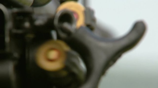 the gun shoots in the field