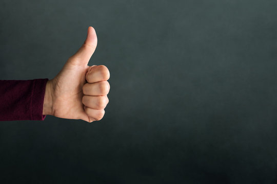 Customer Experience Concept, Hand of Client show Excellent sign with Thumb up for Rating in Satisfaction Survey, Symbol of Meaning "Great"