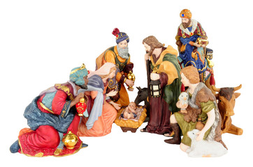 Traditional Christmas nativity scene with Mary and Joseph and baby Jesus isolated on a white background