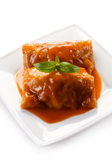 Wrapped meat with tomato sauce