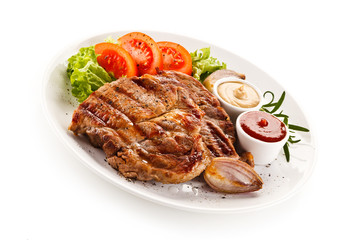 Grilled steaks and vegetables