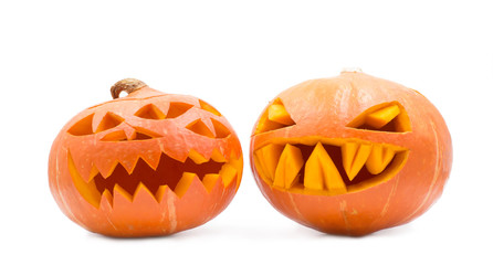 two spooky pumpkins on white background