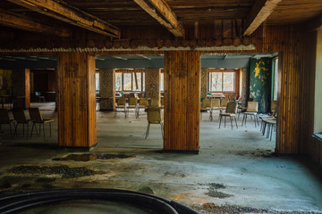 Abandoned children's canteen. Derelict dining room in pioneer camp