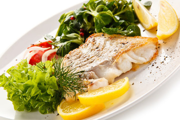 Fish dish - fried fish fillet and vegetables