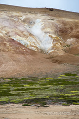 Hverar&ouml;nd, Iceland. Hot vapors in a typical Icelandic landscape, a wild nature of rocks and shrubs, rivers and lakes.