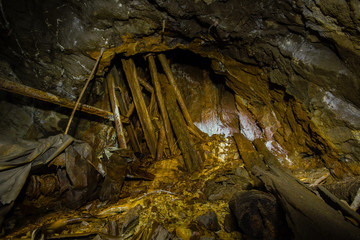 Underground abandoned ore mine shaft tunnel gallery collapsed