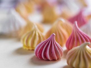 Many Meringue, pattern on white background.