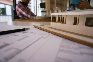 Colleagues interior designer Corporate Achievement Planning Design on blueprint Teamwork Concept...