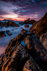 Seascape landscape nature in twilight and rock with colorful of sunset over the sun, Beach Sea, Sunset Sunlight or Sunrise, Twilight Sky Scenic with Sun Silhouette.