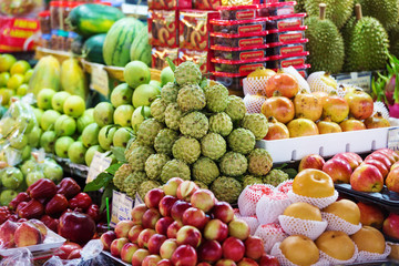Street market with different exotic fruits. Vietnam, Asia