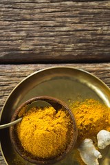 Turmeric powder in plate