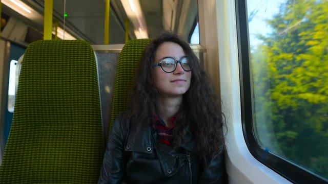young woman in train