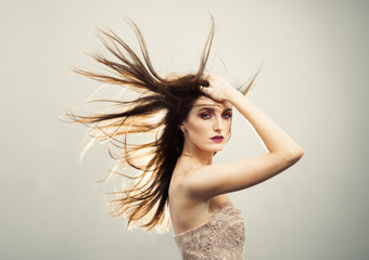 Beautiful Young Woman With Windswept Hair