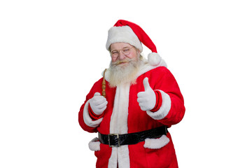Santa with pipe giving thumb up. Authentic Santa Claus with real beard and giving thumb up, isolated on white background. Portrait of Santa with ok geture.
