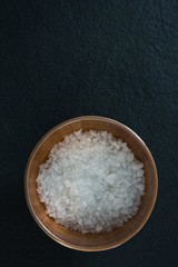 Sea salt in wooden bowl