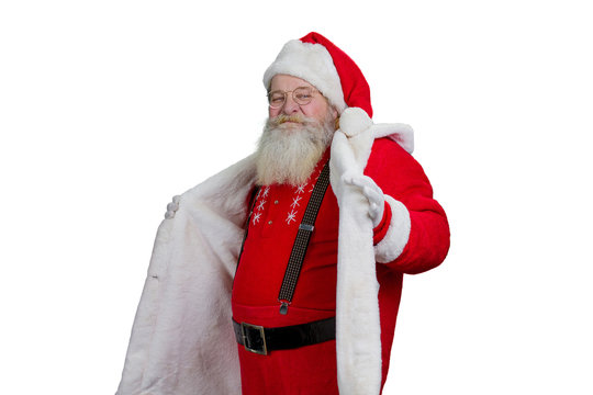 Portrait of Santa Claus on white background. Bearded Santa Claus showing his red festive suit isolated on white background.