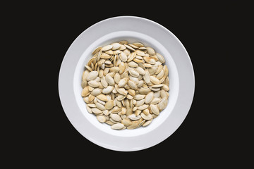 Pumpkin Seeds top view with black background