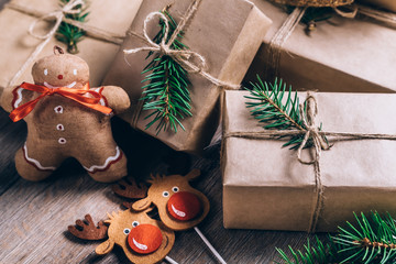 Christmas Gifts with Boxes on Wooden Background. Vintage Style. Closeup, selective focus.