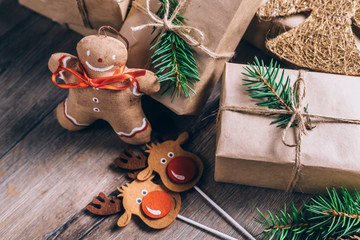 Christmas Gifts with Boxes on Wooden Background. Vintage Style. Closeup, selective focus.