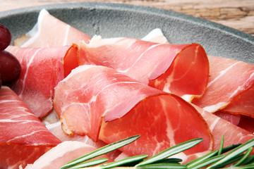 prosciutto with rosemary  or ham of black forest or serrano.