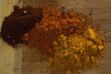 Spices powder on wooden board
