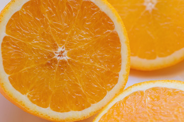 Sliced oranges on a dark background. Selective focus.