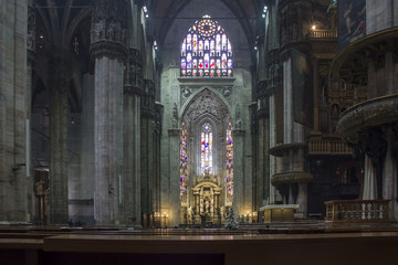 Obraz premium Duomo Catheral in Milan, interiors of the liturgic area with benches and the altar, no people