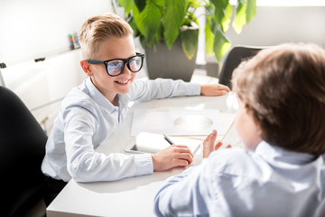 Cheerful kids are enjoying their job