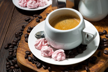 fresh espresso and pink meringues, top view