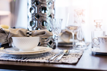 Fototapeta na wymiar dining set with dish and spoon on white clean napkin