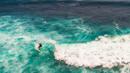 Suluban surf beach direction sign. Bali, Indonesia.