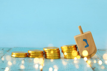 jewish holiday Hanukkah image background with traditional spinnig top and chocolate coins