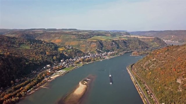 Time lapse flight over autumn Rhine valley near Bacharach town, Germany